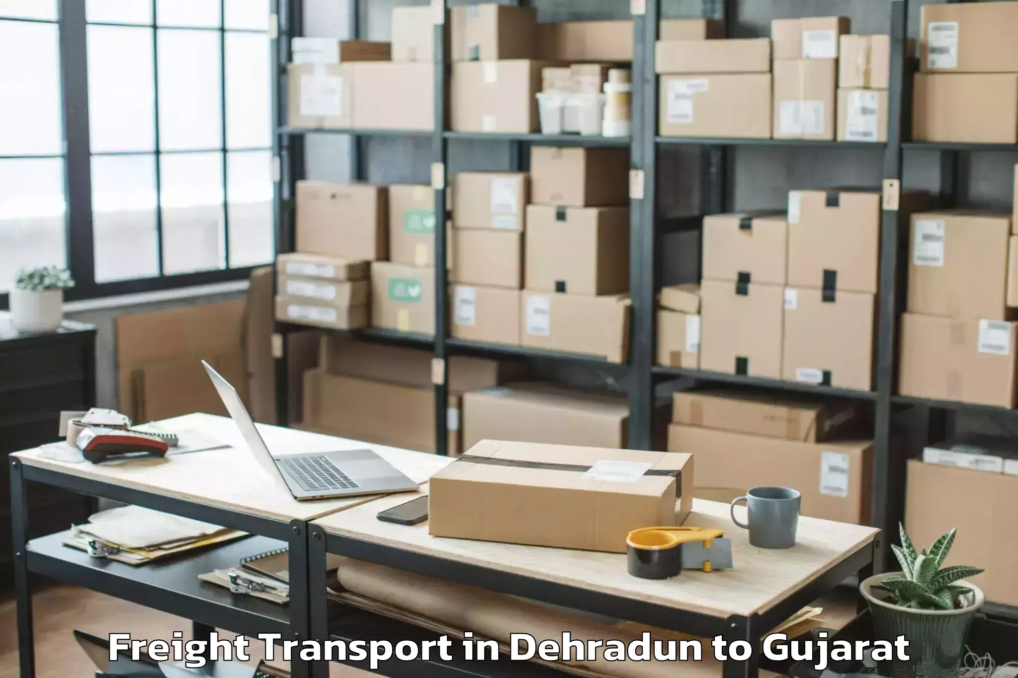 Trusted Dehradun to Patdi Freight Transport